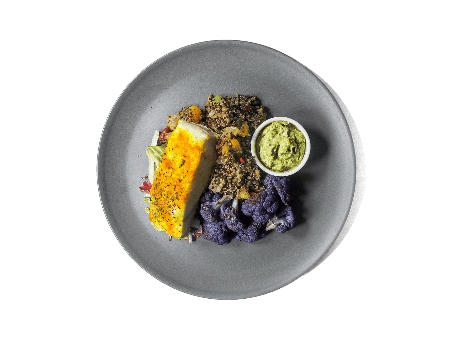 Golden turmeric-roasted halibut meets a nourishing bone broth quinoa pilaf, infused with sweet goji berries, apricots, and golden raisins. Vibrant purple cauliflower and nutrient-rich super greens add color and depth, while a creamy pistachio pesto ties it all together. Packed with anti-inflammatory ingredients and high-quality protein, this dish is as satisfying as it is nourishing.