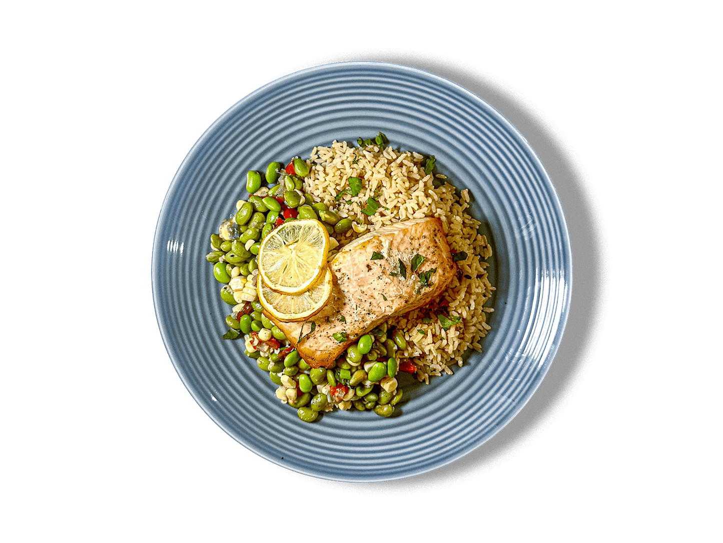 Wild salmon fillet paired with wholesome bone broth rice and a vibrant edamame succotash. This nutrient-packed dish combines delicate flavors and textures for a light yet satisfying dining experience.