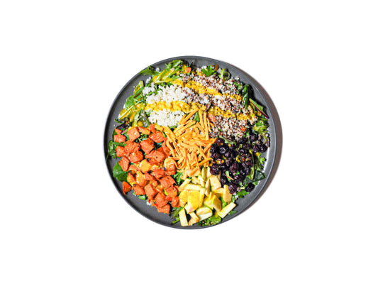 Ladle & Leaf's Autumn Grain Bowl combines hearty grains with organic mixed greens, all dressed in a flavorful curry maple vinaigrette. This bowl offers a satisfying blend of textures and warm fall-inspired flavors, perfect for a nourishing and seasonal meal.