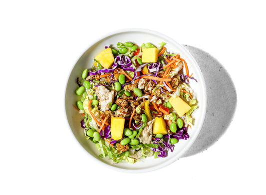 Tenderleaf's Chinese Sous-Vide Chicken Salad showcases tender, perfectly cooked chicken combined with crisp edamame and tossed in a flavorful sesame soy vinaigrette. This refreshing salad delivers a harmonious blend of savory, nutty, and umami notes, making it a satisfying and healthy choice.