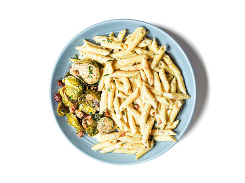 Tenderleaf's Cacio e Pepe with Caramelized Walnut Brussels Sprouts brings a classic Italian favorite to life with a twist. The creamy, peppery pasta is complemented by crispy, caramelized walnut Brussels sprouts, adding a nutty sweetness that perfectly balances the savory richness of the dish.