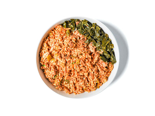 Brenda's French Soul Food's Jambalaya is a vibrant Creole classic featuring smoky sausage, perfectly cooked rice, and a medley of spices. Paired with a side of tender collard greens, this dish offers a hearty, flavorful experience that's steeped in New Orleans tradition.