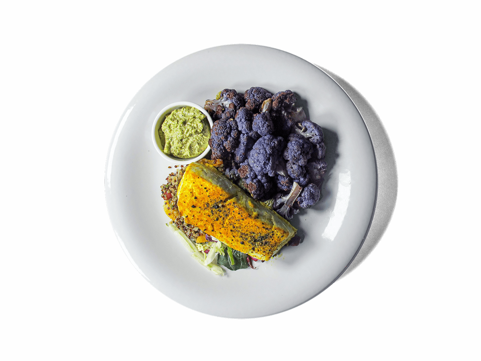 Golden turmeric-roasted halibut meets a nourishing bone broth quinoa pilaf, infused with sweet goji berries, apricots, and golden raisins. Vibrant purple cauliflower and nutrient-rich super greens add color and depth, while a creamy pistachio pesto ties it all together. Packed with anti-inflammatory ingredients and high-quality protein, this dish is as satisfying as it is nourishing.