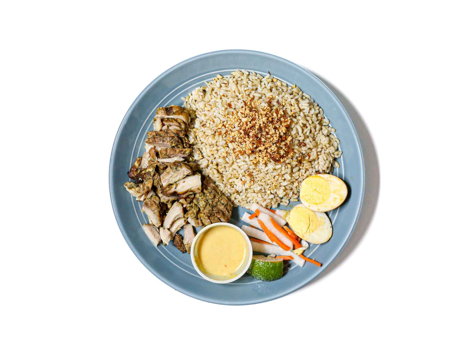 Asian Box's The Steph Curry Gameday Special features flavorful six-spice chicken paired with a rich and aromatic yellow coconut curry. This dish offers a delicious blend of bold, savory spices and creamy coconut, making for a satisfying and energizing meal perfect for game day.