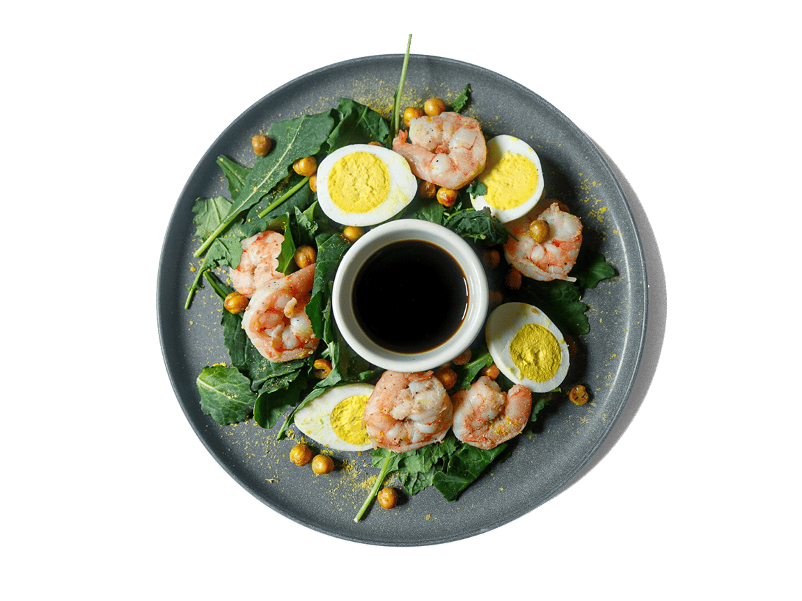 A vibrant blend of crispy romaine, tender kale, and perfectly grilled shrimp. Topped with crispy chickpeas and a generous sprinkle of savory nutritional yeast, this salad delivers a rich, umami-packed twist on the classic Caesar.